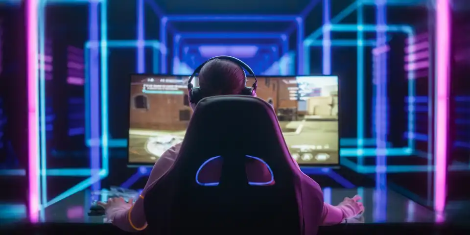 Young Female Professional Gamer Competing in an E-Sports Championship Event in a Futuristic Neon Arena